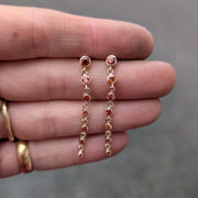 Orange sapphire earrings dangle movement sparkling